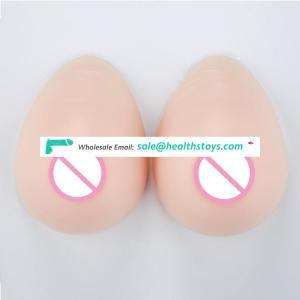 Silicone breast form with adhesive for crossdresser prosthesis mastectomy